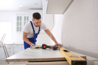 Man installing new countertop